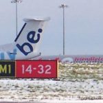 Planes in the snow at airport