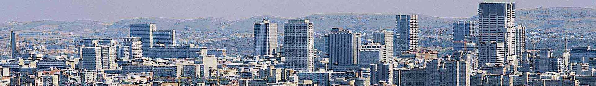 African city with mountains beyond